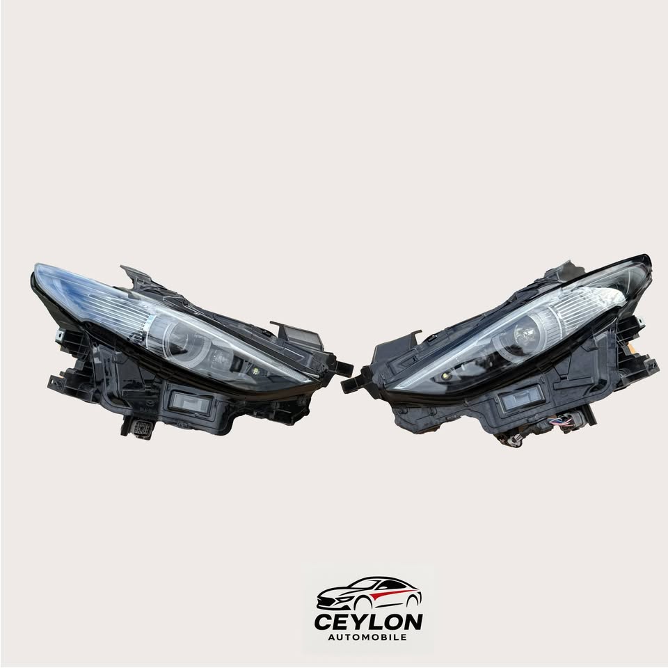 OEM Mazda 3 BM/BN Headlights - HID Model (left).